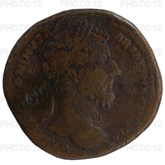 Sestertius, Marcus Aurelius (121–180; Roman emperor 161–180), issuer. Obverse: Head of Marcus Aurelius with laurel wreath facing right, inscription M AVREL ONINVS AV — ARMENIACVS PM. Reverse: Mars standing right, holding a spear in his raised right hand, resting his left hand on a round shield standing on the ground, inscription TR P XVIII — IMP II COS III, in SC. Date: 163–164. Roman Empire (27 BC–476), Rome. Coin; diameter 30.5–31.5 mm, weight 24.80 g, axis 0°.