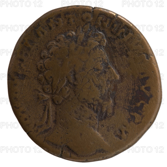 Sestertius of Marcus Aurelius (121–180; Roman emperor 161–180). Obverse: Head of Marcus Aurelius in a laurel wreath facing right, inscription M•VREL ANTONINVS AVG•PM around. Reverse: Victoria standing on a globe facing left, holding a wreath in her outstretched right hand and a palm in her left, inscription TR P XVIII–, M•COS III around, with S C in fields. Date: 163–164. Roman Empire, Rome. Coin: bronze, diameter 30.0–30.5 mm, weight 19.50 g, axis 180°. Subjects/icons: Roman deities (Victoria), wreaths, palms, globe; iconography of Marcus Aurelius.