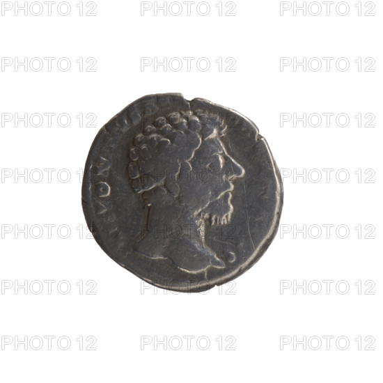Denarius, Marcus Aurelius (121–180; Roman emperor 161–180) — obverse: head of Marcus Aurelius bare to the right, inscription ANTONINVS A S all around; reverse: personification of Armenia in a short robe, trousers and pointed cap, seated left, supporting her head with her right hand, left hand resting on a bow and a quiver, with a shield and a standard (vexillum) in front; inscriptions XIX IMP II COS III; dated 164–165; Roman Empire, Rome; coin, dia. 16.5 mm, weight 3.20 g, axis 0°