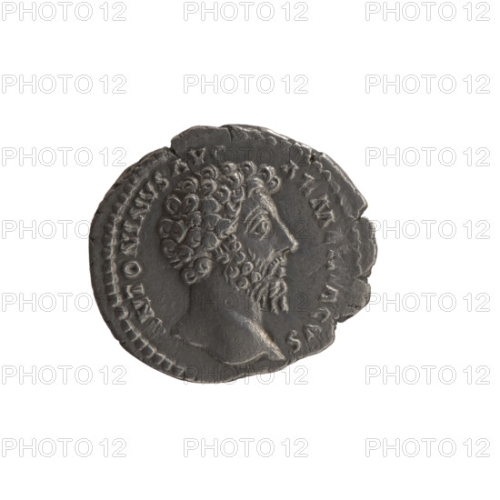 denarius, Marcus Aurelius (121–180; Roman emperor 161–180), issuer; Roman deities: Mars; iconography: shields, spears. Obverse: Head of Marcus Aurelius uncovered facing right, legend NTONINVS AVG - ARM, ACVS; Reverse: Mars standing right, holding a spear in his right hand, left hand resting on a shield standing on the ground, legend PM TR P XIX - IMP I, COS III; date circa 164–165. Roman Empire (27 BC–476), Rome. Coin: diameter 17.0–19.0 mm, weight 2.77 g, axis 180 degrees.