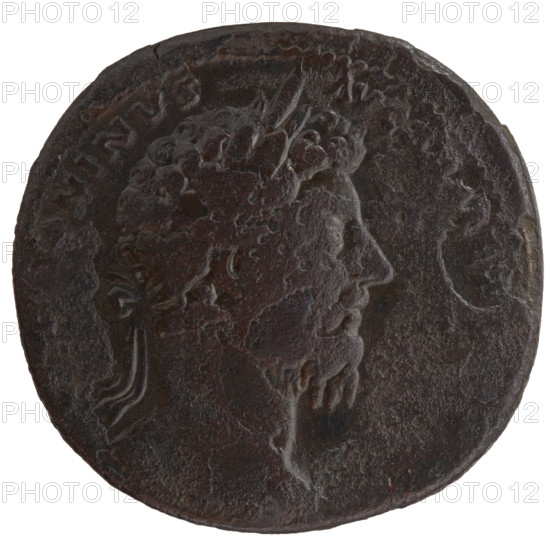 Sestertius of Marcus Aurelius (121–180; Roman emperor 161–180). Obverse: Head of Marcus Aurelius with laurel wreath facing right, inscription ONINVS - AVG. Reverse: Providentia standing frontally, head turned left, holding a long scepter in her left hand and a wand in her right above a globe, inscription POT XIX - IMP III COS III, in SC fields. Date: 165. Roman Empire, Rome. Coin. Diameter 30.5–31.5 mm, weight 24.38 g, axis 345°.