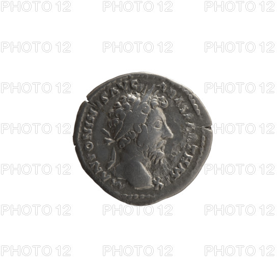 Denarius of Marcus Aurelius (121–180; Roman emperor 161–180). Obverse: Head of Marcus Aurelius with a laurel wreath facing right, inscription M ANTONINVS AVG - A, MP, TH M, X around. Reverse: Victoria stands half-naked frontally, head turned right, holding a palm branch in her right hand and fastening a shield inscribed VIC PAR to a tree with her left hand, inscription TR P XX IMP IIII COS III around. Date: 166. Place: Rome, Roman Empire (27 BC–476). Coin: diameter 18.5–19.0 mm, weight 3.05 g, axis 0°.