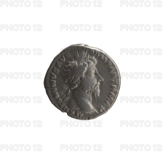 Denarius of Marcus Aurelius (121–180; Roman emperor 161–180). Obverse: Head of Marcus Aurelius in a laurel wreath facing right, inscribed 'M ANTONINVS AVG - ARM PARTH MAX'. Reverse: Victoria stands half-naked frontally, head turned right, holding a palm branch in her right hand and fastening a shield inscribed 'VIC PAR' to a tree with her left. Legend 'TR P, X - IMP IIII COS III' (all around). Date: 166. Place: Rome, Roman Empire. Medium: silver coin. Diameter: 17.0–18.0 mm. Weight: 3.30 g. Axis: 0°.