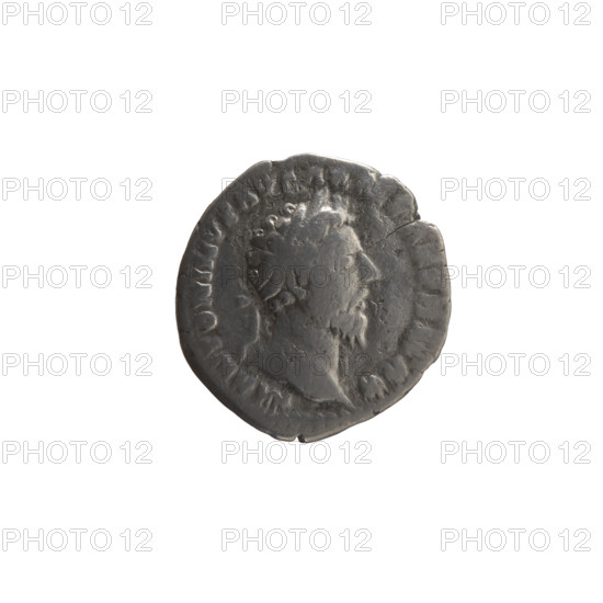 Denarius of Marcus Aurelius (121–180; Roman emperor 161–180). Obverse: head of Marcus Aurelius wearing a laurel wreath, facing right, inscription M ANTONINVS AVG ARM PARTH MAX. Reverse: Victoria standing half-naked frontally, head turned right, holding a palm branch in her right hand and fastening a shield inscribed VIC PAR to a tree with her left hand, inscription TR P X — IMP IIII COS III. Date: 166. Place: Rome, Roman Empire. Coin; diameter 18.0–18.5 mm, weight 2.75 g, axis 0°.