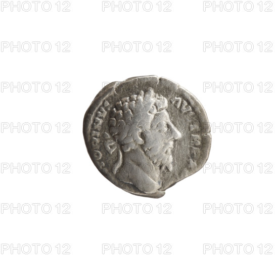 Denarius of Marcus Aurelius (121–180; Roman emperor 161–180). Obverse: Head of Marcus Aurelius with laurel wreath facing right, legend TONINVS - AVG TR P XX. Reverse: Mars standing right, holding a spear in his right hand, resting his left on a shield standing on the ground, legend IMP VI - COS III. Date: 171–172. Roman Empire (27 BC–476), Rome. Coin; diameter 18.0 mm; weight 3.05 g; axis 0 degrees.