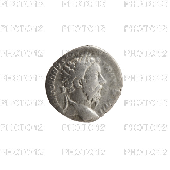 Denarius of Marcus Aurelius (121–180; Roman emperor 161–180), issue 173–174. Obverse: head of Marcus Aurelius with laurel wreath facing right, legend 'M ANTONINVS A, RP, VIII'. Reverse: Germanic captive seated to the right under a trophy, around which lies a weapon, legends 'IMP VI - COS III'. Iconography: prisoners, shields, trophies, spears, Germans. Roman Empire (27 BC–476), Rome. Coin: diameter 17.5–18.5 mm, weight 2.87 g, axis 0°.