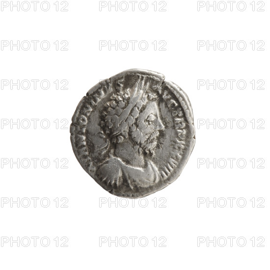 Denarius of Marcus Aurelius (121–180; Roman emperor 161–180). Obverse: Bust of Marcus Aurelius in laurel wreath, armor and drapery, facing right; inscription M ANTONINVS - VG TR P XXVIII. Reverse: Victoria walking right, holding a wreath in her outstretched right hand and a trophy resting on her left shoulder; inscription IMP VI - COS III. Date: 173–174. Roman Empire, Rome. Coin; diameter 17.5–18.0 mm, weight 2.54 g, axis 0°.