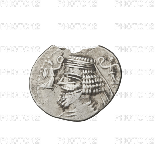 Drachma, Phraates V; obverse: bust of Phraates V wearing a diadem, facing left, with Nike on both sides holding a wreath. Reverse: Arsakes I seated on a throne to the right, holding a bow in his right hand; monogram at right. Broken coin; coins depict busts, bows, diadems; iconography of the Parthian Kingdom. Date: 2 BC–4 AD. Place: Parthia (mint in Iran). Weight: 3.45 g.