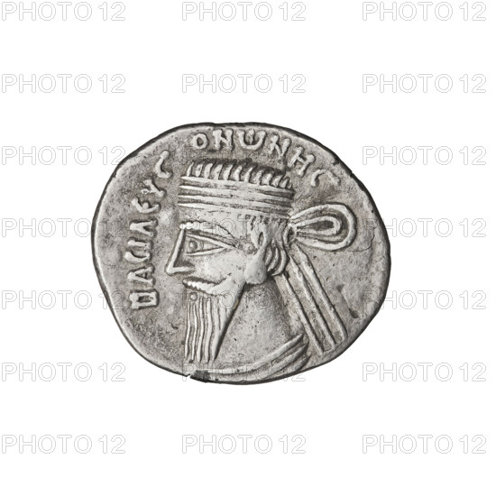 Drachma of Vonones I (8–11 CE). Obverse: diademed head of Vonones I facing left. Reverse: Nike standing facing right, palm in outstretched right hand, wreath in left hand. Parthian Kingdom, Iran. Coin; diameter 18.0 × 21.0 mm; weight 3.60 g. Subjects: wreaths, Nike, diadems, heads.