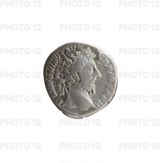 Denarius of Marcus Aurelius (121–180; Roman emperor 161–180), 175 CE. Obverse: Head of Marcus Aurelius with laurel wreath facing right, inscribed M ANTONINVS AVG - GERM SARM. Reverse: Naked Genius standing left, holding a patera in his right hand and two ears of corn in his left, inscribed TRP XXIX - IMP VIII COS III. Iconography: ears of corn, personification (Genius), paterae. Roman Empire (27 BC–476), Rome. Coin; diameter 18.0 mm; weight 3.15 g; axis 0°.