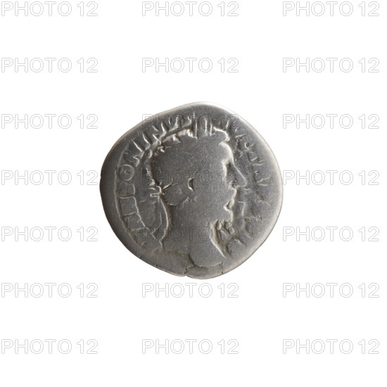 Denarius of Marcus Aurelius (121–180; Roman emperor 161–180), 174–175. Obverse: Head of Marcus Aurelius with laurel wreath facing right, inscription 'M ANTONINVS - AVG TR P XXIX'. Reverse: Naked Genius standing left, holding a patera in his right hand and two ears of corn in his left, inscription 'IMP VII - COS II'. Roman Empire (27 BC–476), Rome. Coin; diameter 17.5–18.5 mm, weight 2.87 g, axis 0°.