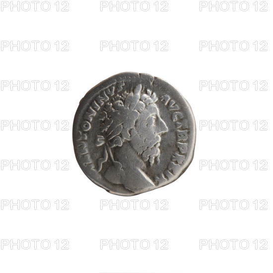 Denarius of Marcus Aurelius (121–180; Roman emperor 161–180), 174–175. Obverse: Head of Marcus Aurelius with laurel wreath facing right, inscription M ANTONINVS - AVG TR P XXIX. Reverse: Mars, naked except for a cloak and helmet, walking right, holding a trophy in his left hand and a spear in his right, inscription IMP VII - COS III. Roman Empire (27 BC–476). Coin; diameter 17.5–18.5 mm, weight 3.15 g, axis 0°.