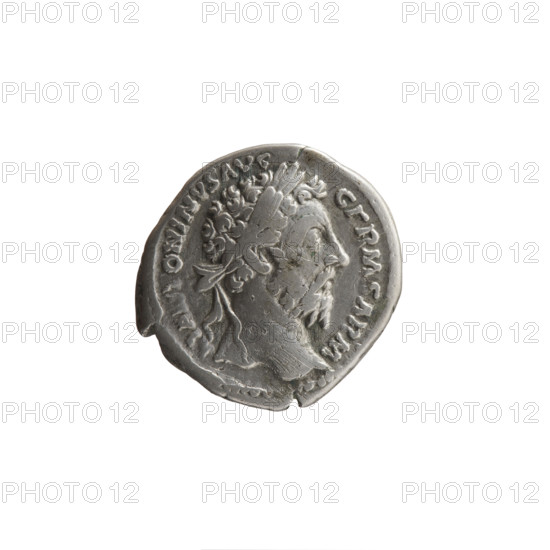 Denarius of Marcus Aurelius (121–180; Roman emperor 161–180). Obverse: Head of Marcus Aurelius in laurel wreath facing right, inscribed M ANTONINVS AVG - GERM SARM. Reverse: Roma standing left, holding Victory (Victoria) in his outstretched right hand and a spear in his left, inscribed TR P XXIX - IMP VIII COS III. Personifications: Roma, Victoria. Date: 175. Roman Empire. Coin. Diameter 18.0–19.0 mm, weight 3.35 g, axis 0°.