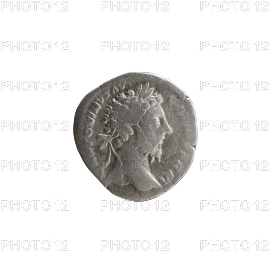 Denarius, Marcus Aurelius (121–180; Roman emperor 161–180), issuer Marcus Aurelius; obverse: head of Marcus Aurelius in a laurel wreath facing right, inscription ANTONINVS AV - GERM SARM; reverse: Victoria (seated left) holding a patera in her right outstretched hand and a palm leaf in her left, inscriptions TR P XXIX - IMP VIII COS III; attributes: Victoria, palm branches, paterae; iconography: Marcus Aurelius; date: 175; culture/place: Roman Empire (27 BC–476), Rome; object type: coin; materials/measurements: coin, diameter 17.5 mm and 18.5 mm, weight 3.05 g, axis 0 degrees.