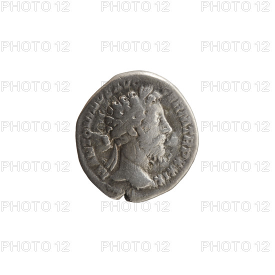 Denarius, Marcus Aurelius (121–180; Roman emperor 161–180), issuer; obverse: head of Marcus Aurelius in a laurel wreath facing right, inscribed 'M ANTONINVS AVG - GERM TR P XXIX'; reverse: Victoria seated left, holding a patera in her outstretched right hand and a palm leaf in her left, inscribed 'IMP VII - COS III'; dates: 174–175; Roman Empire (27 BC–476), Rome; coin; diameter 16.5–17.5 mm; weight 3.10 g; axis 180 degrees.