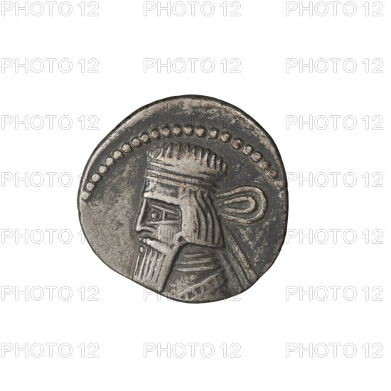 Drachma of Gotarzes II (King of the Parthians; 40–51). Obverse: bust of Gotarzes II left, wearing a diadem, with a long beard in a decorated robe. Reverse: Arsakes I (King of the Parthians; ca. 247–217 BC) seated on a throne facing right, holding a bow, monogram below the bow. Parthian Kingdom, Iran. Coin; diameter 19.0 mm, weight 3.75 g.
