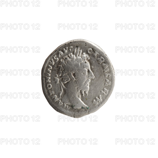 Denarius, Marcus Aurelius (121–180; Roman emperor 161–180), issuer. Obverse: Head of Marcus Aurelius with laurel wreath facing right, inscription M ANTONINVS AVG - GERM SARM. Reverse: Pile of war spoils — armor, shields, spears, trumpet (carnyx), standard (vexillum) and helmet — with inscription TR P XXXI IMP VIII COS III PP, episode DE GERM, dated 176–177. Iconography: spoils of war, spears, shields, carnyxes, armor, Germans. Roman Empire (27 BC–476). Coin; diameter 18.0–19.5 mm, weight 2.97 g, axis 180 degrees.