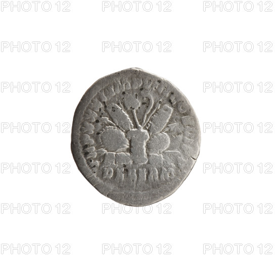 Denarius of Marcus Aurelius (121–180; Roman emperor 161–180), 176–177, Roman Empire. Obverse: Head of Marcus Aurelius with laurel wreath facing right, inscription M ANTONINVS AVG - GERM SARM. Reverse: Pile of war spoils — armor, shields, spears, trumpet (carnyx), standard (vexillum) and helmet — with inscription TR P XXXI IMP VIII COS III PP; episode DE GERM. Coin. Diameter 18.0–19.5 mm, weight 2.97 g, axis 180°.