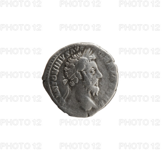 Denarius of Marcus Aurelius (121–180; Roman emperor 161–180), depicting spoils of war: carnyx (trumpet), spears, shields, armor; iconography related to Sarmatians. Obverse: head of Marcus Aurelius with laurel wreath facing right, legend 'M ANTONINVS AVG'. Reverse: pile of war spoils—armor, shields, spears, karnyx, vexillum and helmet—with legend 'TR P XXXI - IMP VIIII COS III PP' (issued in the campaign 'DE SARM', 176–177). Roman Empire, Rome; coin; diameter 18.0 mm; weight 2.80 g; axis 0°.
