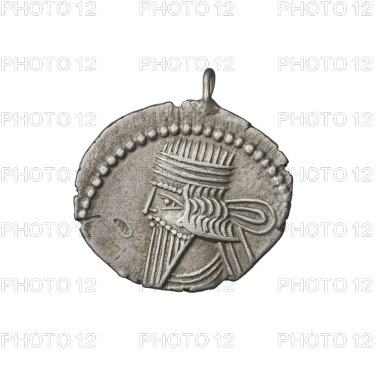 Drachma of Vologases I (51–79). Obverse: bust of Vologases I wearing a diadem, king facing left. Reverse: Arsakes I (King of the Parthians; ca. 247–217 BC) sitting on a throne, facing right, holding a bow; monogram below the bow. Coin shows an eye. Parthian Kingdom, Seleucia on the Tigris, Iran. Coin; diameter 18.0 × 20.0 mm, weight 3.75 g.