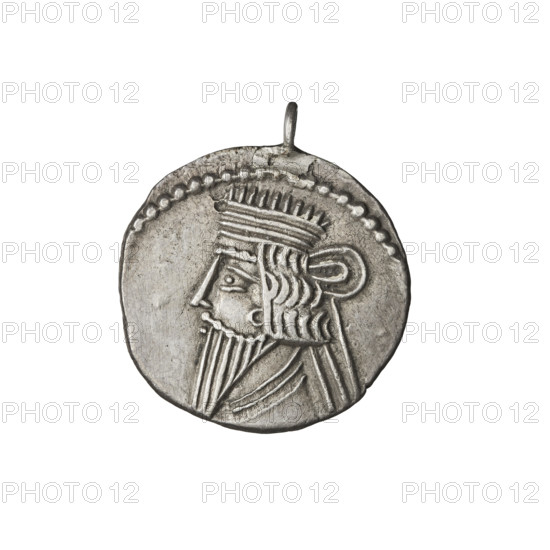 Drachma of Vologases I (51–79 CE). Obverse: bust of Vologases I wearing a diadem, king facing left. Reverse: Arsakes seated on a throne facing right, holding a bow, monogram below the bow. The coin has an eyelet. Parthian Kingdom, Iran. Minted ca. 51–79 CE. Coin; diameter 18.0 × 19.0 mm, weight 3.60 g.