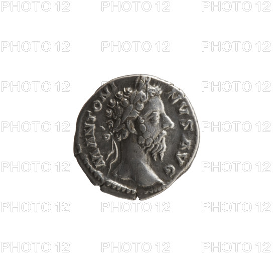 Denarius, Marcus Aurelius (121–180; Roman emperor 161–180), issuer. Aw: Head of Marcus Aurelius in a laurel wreath facing right, inscription M ANTONI-NVS AVG around. Rw: Annona standing left, holding ears of corn above a container (modius) in her right hand and a cornucopia above the prow of a ship in her left, inscription C OS - I - II PP around. Attributes: ears of corn, Annona (personification), personifications, ships, modius, cornucopia. Date: 176–180. Culture: Roman Empire (27 BC–476). Place: Rome. Object type: coin. Diameter: 17.0–18.5 mm. Weight: 3.10 g. Axis: 180 degrees.