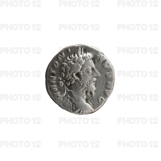 Denarius of Marcus Aurelius (121–180; Roman emperor 161–180). Obverse: Bust of Marcus Aurelius in laurel wreath, armor and cloak (paludamentum), facing right; inscription M ANTONI-NVS AVG. Reverse: Mars standing right, holding a spear in his right hand and resting his left hand on a shield standing on the ground; inscription C OS-III PP. Date: 176–180 CE. Roman Empire (27 BC–476). Coin: diameter 16.5 mm, weight 2.75 g, axis 0°.
