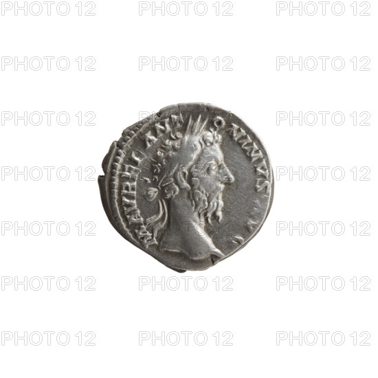 Denarius of Marcus Aurelius (121–180; Roman emperor 161–180), 177–178. Obverse: Head of Marcus Aurelius with laurel wreath facing right, inscription 'M AVREL ANT-ONINVS, VG'. Reverse: Mars standing right, holding a spear in his right hand and resting his left hand on a shield standing on the ground, inscription 'TR P XXXII IM, VIIII COS III PP'. Iconography: Roman deities (Mars), spears, shields. Roman Empire (27 BC–476), Rome. Coin; diameter 17.0–18.0 mm, weight 2.90 g, axis 0°.