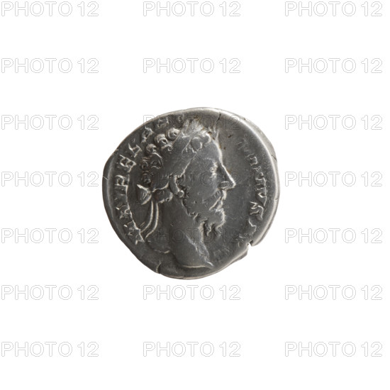 Denarius of Marcus Aurelius (121–180; Roman emperor 161–180), struck 177–178. Obverse: head of Marcus Aurelius in laurel wreath to the right, inscription M AVREL ANT - ONINVS AVG. Reverse: Roma seated on armor and shields to the left, holding Victoria in her outstretched right hand and a dagger (parazonium) in her left, inscription RP XXXII - IMP - VIIII COS III PP. Roman Empire; Rome. Coin; diameter 17.0–17.5 mm, weight 2.90 g, axis 0°.