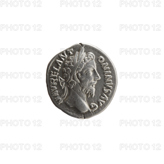 Denarius of Marcus Aurelius (121–180; Roman emperor 161–180). Obverse: Head of Marcus Aurelius with laurel wreath facing right, inscription 'M AVREL ANT - ONINVS AVG' all around. Reverse: Mars standing right, holding a spear in his right hand, resting his left hand on a shield standing on the ground, inscription 'TR P XXXIII - IMP VIIII COS III PP' all around. Date: 178–179. Roman Empire (27 BC–476), Rome. Coin; diameter 17.0–18.0 mm, weight 3.05 g, axis 180°.
