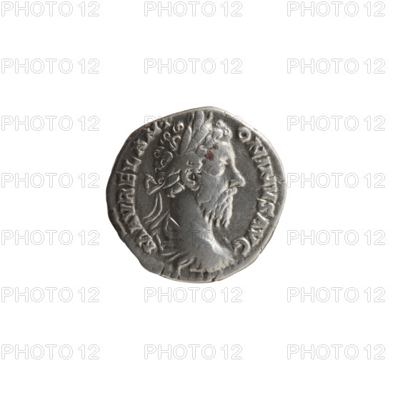 Denarius of Marcus Aurelius (121–180; Roman emperor 161–180). Obverse: Bust of Marcus Aurelius in laurel wreath, armor and cloak (paludamentum), facing right, inscription M AVREL ANT - ONINVS AVG. Reverse: Fortuna seated left, holding a rudder in her right hand and a cornucopia in her left, a wheel under the seat, inscription TR P XXXIIII - IMP X COS III PP. Date: 179–180. Roman Empire (27 BC–476). Coin. Diameter 17.0–17.5 mm, weight 3.02 g, axis 0°.