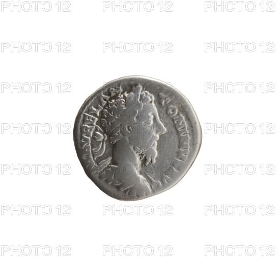 Denarius of Marcus Aurelius (121–180; Roman emperor 161–180), 179–180. Obverse: Bust of Marcus Aurelius in laurel wreath, armor and cloak (paludamentum) facing right, legend M AVREL AN - TONINVS AVG. Reverse: Fortuna seated left, holding a rudder in her right hand and a cornucopia in her left, a wheel under the seat, legend TR P XXXIIII - IMP X COS III PP. Roman Empire (27 BC–476). Coin; diameter 17.0–17.5 mm, weight 3.38 g, axis 180°.