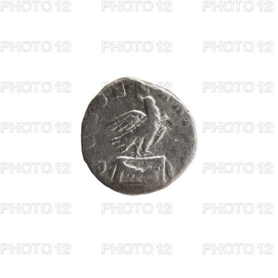 Denarius, posthumous issue for Marcus Aurelius (121–180; Roman Emperor 161–180), issued by Commodus (161–192; Roman Emperor 177–192). Obverse: head of Marcus Aurelius bare to the right, inscription DIVVS M AN-TONINVS PIVS. Reverse: eagle standing on an altar decorated with a garland, facing right but turning head left, inscription CONSECRATIO. Date: 180. Roman Empire, Rome. Coin; diameter 16.0 mm; weight 2.50 g; axis 180°. Subjects: animals, garlands, eagles, altars; iconography of Marcus Aurelius and Commodus.