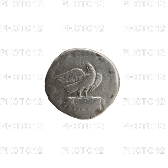 Denarius, Marcus Aurelius (121–180; Roman emperor 161–180), posthumously issued by Commodus (161–192; Roman emperor 177–192). Obverse: head of Marcus Aurelius, bare, facing right, inscribed DIVVS M ANT – ONINVS PIVS. Reverse: eagle standing on an altar decorated with a garland, facing right, head turned left, inscribed CONSE I (or CONSE, I). After 180 CE. Roman Empire. Rome. Coin. Diameter 16.5–17.5 mm. Weight 3.15 g. Axis 0°. Icons: animals, garlands, eagles; iconography: Marcus Aurelius, altars; materials: coin.