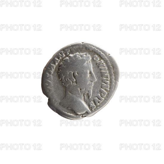 Denarius, Marcus Aurelius (121–180; Roman emperor 161–180), posthumously issued for Commodus (161–192; Roman emperor 177–192). Obverse: Head of Marcus Aurelius uncovered facing right, inscription VVS M ANT – ONINVS PIVS. Reverse: Funeral pyre with four tiers, topped by a quadriga in which the emperor stands, inscription CONSECRATI. After 180. Roman Empire (27 BC–476), Rome. Silver coin, diameter 18.5 mm, weight 3.10 g, axis 15°.