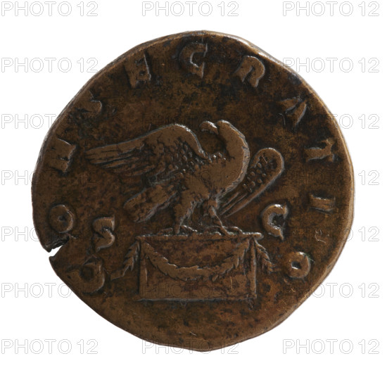 Sestertius, after 180 CE. Obverse: Head of Marcus Aurelius without a covering to the right, inscription DIVVS M ANT - ONINVS PIVS all around. Reverse: Eagle stands on an altar decorated with a garland to the right, turns its head to the left, inscription CONSECRATIO all around, fields marked SC. Issuer: Commodus (posthumous issue for Marcus Aurelius). Materials/style: Roman coin, bronze; Roman Imperial iconography (altars, eagles). Date/period: Roman Empire (27 BCE–476 CE). Dimensions: diameter 31.5 mm, weight 26.35 g, axis 15°.