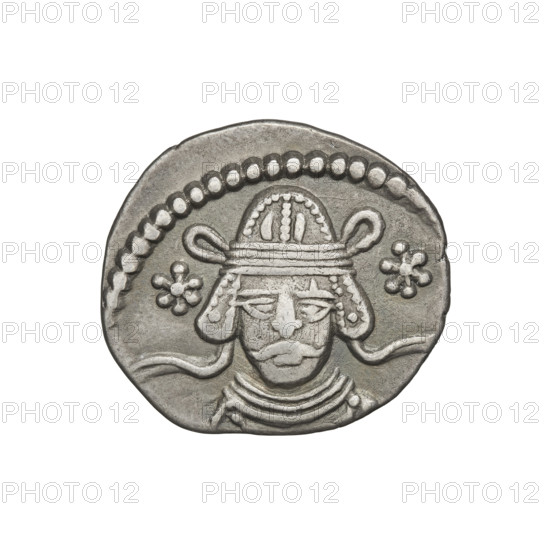 Drachma of Vardanes II (55–58 CE). Obverse: frontal head of Vardanes II with two stars at the ruler's sides. Reverse: Arsakes seated on a throne facing right, holding a bow; monogram below the bow. Parthian Kingdom (Parthia), Ecbatana (Iran). Materials/function: coin. Diameter 18.0 × 20.0 mm; weight 3.70 g. Subjects/icons: bows (arms), tiaras, stars; iconography references Arsakes I (King of Parthians; ca. 247–217 BCE).