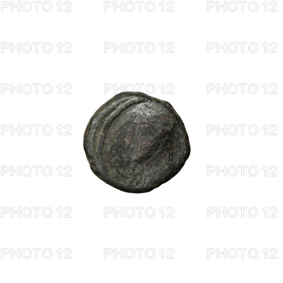 Bronze coin of Pacorus II (r. 77–109), Parthian Empire, Iran. Obverse: head of Pacorus II in diadem and tiara, facing left. Reverse: male head in high headdress, facing right. Dimensions: diameter 9.5 × 10.0 mm; weight 1.65 g.