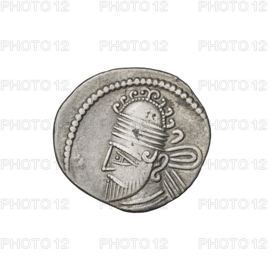 Drachma of Vologases II (77–80). Obverse: head of Vologases II turned left, wearing a tiara decorated with seven bosses. Reverse: Arsakes seated on a throne turned right, holding a bow; monogram below the bow. Parthian Kingdom, Iran. Coin; diameter 19.0 × 20.0 mm, weight 3.75 g.