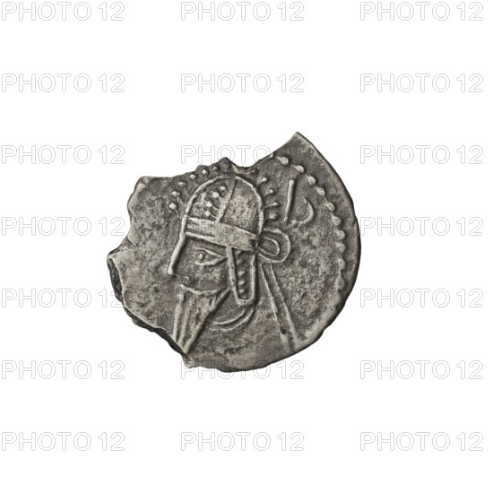 Drachma, Artabanos IV (king of Parthia; 213–224 AD). Obverse: bust of Artabanos IV wearing a tiara, king facing left. Reverse: Arsakes seated on a throne, bow in hand, facing right; below the arch – monogram. Iconography references Arsakes I (king of Parthia; ca. 247–217 BC). Damaged coin, 213–227 AD, Parthia (Ecbatana, Iran). Coin: diameter 20.5–21.0 mm, weight 3.30 g.