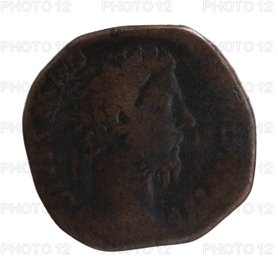 Sestertius, Marcus Aurelius (121–180; Roman Emperor 161–180), posthumous; issuer Commodus (161–192; Roman Emperor 177–192). Obverse: head of Marcus Aurelius without a covering to the right, inscription DIVVS M AN - INVS PIVS all around. Reverse: eagle stands on a globe to the right, head turned to the left, inscription CONSECRATIO all around, in SC fields. Iconography: animals, eagles, globes. After 180, Rome, Roman Empire. Coin. Diameter 28.0–29.0 mm; weight 20.87 g; axis 195°.