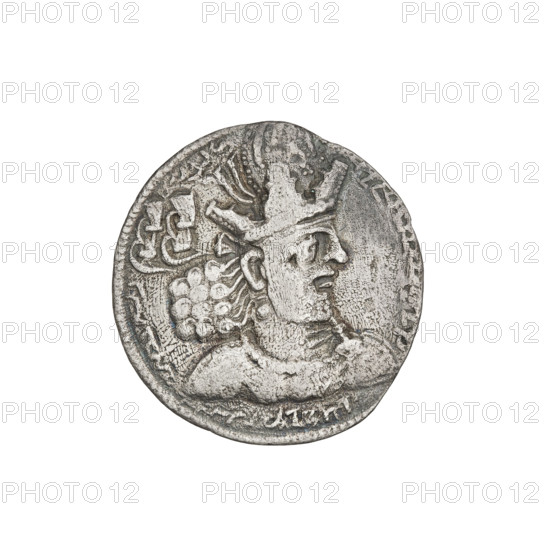 Drachma of Shapur II (ruler of Persia; 309–379). Obverse: Bust of Shapur II wearing a crown topped with a korymbos, facing right; Pahlavi inscription. Reverse: Fire altar with flames containing a male bust facing right; on the sides the king and the priest face each other, both holding barsomas; pearl rim; Pahlavi inscription. Sassanid art, Sassanid Kingdom; Iran/Persia. Coin, 309–379. Diameter 19.5–20.0 mm; weight 3.20 g.