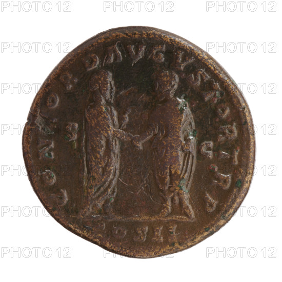 Sestertius, Lucius Verus (130–169), Roman emperor 161–169 (issuer). Obverse: Head of Lucius Verus with laurel wreath facing right, legend 'IMP CAES L AVREL - VERVS AVG.' Reverse: Lucius Verus and Marcus Aurelius in togas standing opposite each other, holding scrolls and shaking hands, legend 'CON, ORD AVGVSTOR TR P' with 'COS II' in section and letters 'S - C' in fields. Date: 161. Roman Empire, Rome. Coin; bronze; weight 25.15 g; diameter 31.0–32.0 mm; axis 0°.