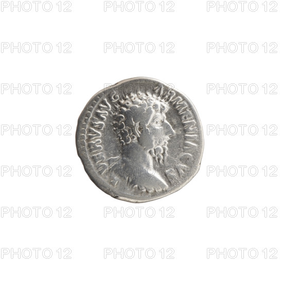Denarius of Lucius Verus (130–169; Roman emperor 161–169), 163–164. Obverse: Bust of Lucius Verus bareheaded and in armor, facing right; inscription L VERVS AVG - ARMENIACVS. Reverse: Mars standing right, holding a spear in his right hand and resting his left on a round shield on the ground; inscription TR P IIII - IMP II COS II. Roman Empire (27 BC–476). Coin: diameter 17.5 mm, weight 3.20 g, axis 180°.
