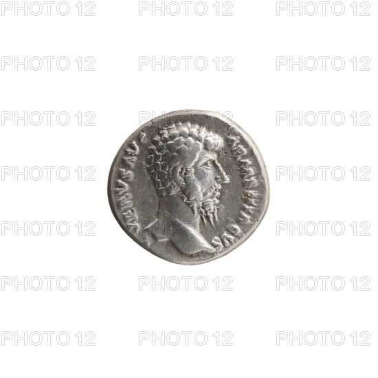 Denarius of Lucius Verus (130–169; Roman emperor 161–169). Obverse: Head of Lucius Verus without a cap to the right, legend 'L VERVS AVG - ARMENIACVS.' Reverse: Mars standing right, holding a spear in his right hand and resting his left on a round shield standing on the ground, legend 'TR P V - IMP II COS II.' Date: 164–165. Roman Empire (27 BC–476). Coin. Diameter 15.5–16.5 mm, weight 3.30 g, axis 0°. Iconography: Roman deities (Mars), shields, spears.