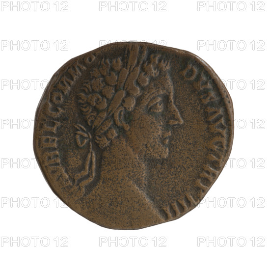 Sestertius of Commodus (161–192; Roman emperor 177–192). Obverse: head of Commodus in a laurel wreath facing right, legend 'AVREL COMMO—DVS AVG TR P IIII'. Reverse: Minerva stands frontally with head turned left; with her right hand she pours incense on a burning altar, with her left hand she holds a round shield and a spear standing on the ground, legend 'IMP II—COS II PP' in SC fields. Date: 179. Roman Empire (27 BC–476). Rome. Coin. Diameter 27.5–29.5 mm, weight 20.55 g, axis 180 degrees.