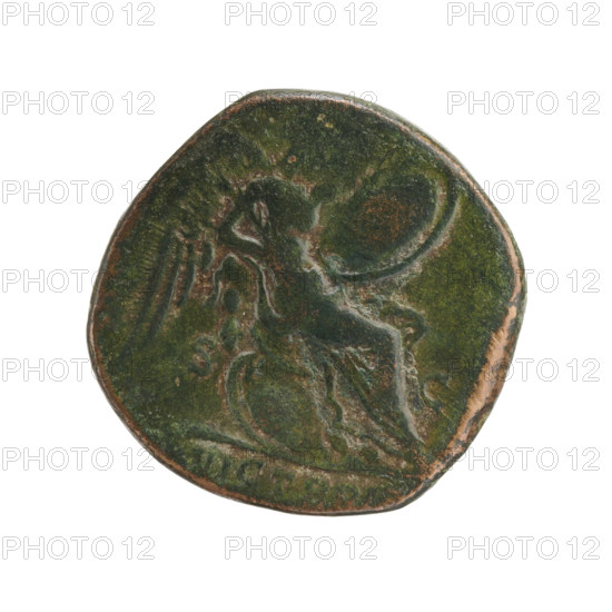 sestertius, Commodus (161–192; Roman emperor 177–192) (issuer); obverse: head of Commodus in a laurel wreath to the right, legend 'M COMMODVS ANTOG PIVS B' (all around); reverse: Victoria half-naked sitting on shields to the right, holding a stylus in her right hand and a shield resting on her knees in her left, legend with 'VICT BRIT' and 'SC' in fields; iconography: Victoria, shields, Roman deities; date: 184–185; Roman Empire; Rome; coin; diameter 27.0 mm; weight 20.90 g; axis 180 degrees