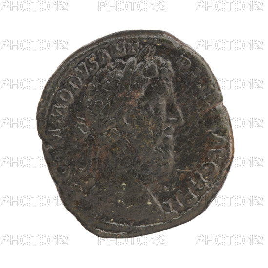 Sestertius of Commodus (161–192; Roman emperor 177–192). Obverse: Head of Commodus in a laurel wreath to the right, inscription 'M COMMODVS ANT - P X AVG BRIT'. Reverse: Emperor in a toga sitting on a curule chair to the left, holding a globe in his right hand and a scroll in his left; behind his head flies Victoria with a wreath, inscriptions 'PM' and 'IN SC' in fields. Iconography: Roman deities (Victoria), globes, scrolls, curule chair. Roman Empire (27 BC–476), Rome. Coin: diameter 27.5–30.0 mm, weight 23.15 g, axis 180 degrees.