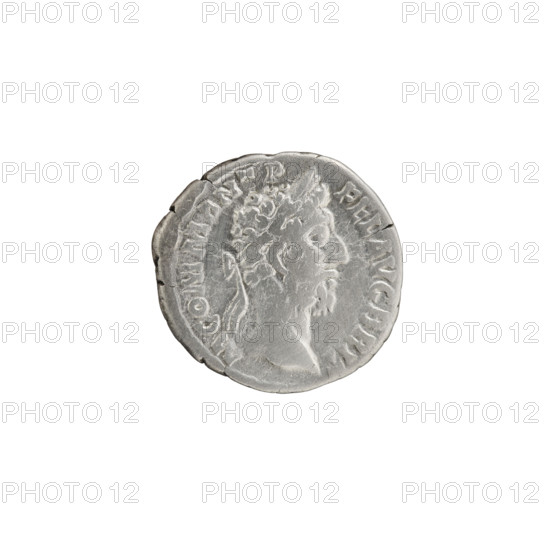 Denarius of Commodus (reigned 177–192). Obverse: laureate head of Commodus facing right, inscription M COMM ANT P - FEL AVG BRIT. Reverse: Hilaritas standing left; in her outstretched right hand a short twig, in her left hand a long palm branch, inscription HILAR AVG PM TR P XII IMP VIII COS V PP. Date: 186–187. Roman Empire, Rome. Coin. Diameter 17.5–18.5 mm, weight 2.77 g, axis 0°.