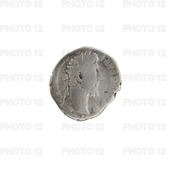 Denarius of Commodus (reigned 177–192). Obverse: head of Commodus in laurel wreath facing right, legend M • COMM ANT P • L AVG BRIT PP. Reverse: Fortuna standing left with her foot on the prow of a ship, holding a caduceus in her right hand and a cornucopia in her left, legend FOR FEL PM TR P XIIII COS V DES VI. Roman Empire, 189. Coin (Rome); silver; diameter 16.5–17.5 mm; weight 2.80 g; axis 30°.